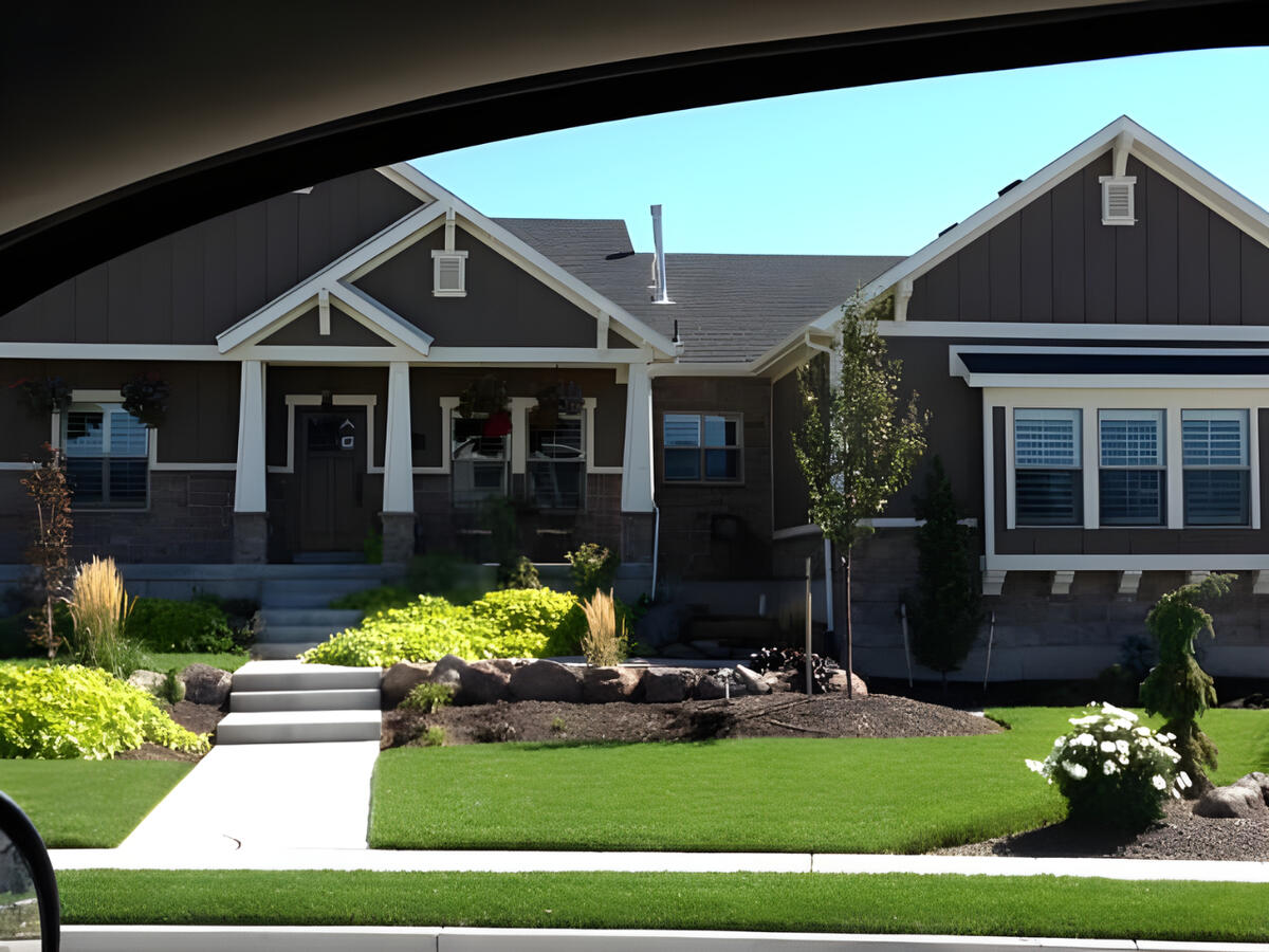 Gray house with lawn Gray house with lawn